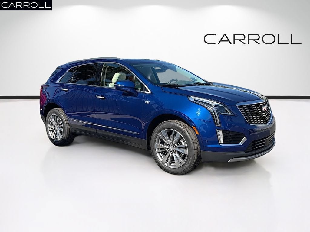 2026 Cadillac XT5 Premium Luxury in Opulent Blue Metallic — front three-quarter view